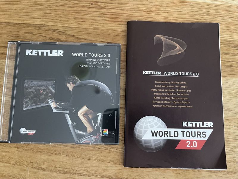 Cyklotrenažér Kettler Racer S + SW World Tours a sada 14 DVD World Tour Videos