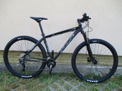 Nové 29" kolo na rámu Scud 2SC camou 19", Deore 2x10, vzduch. vidlice Suntour XCR RL-R air