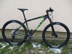 Nové 29" kolo na rámu Scud 2SC camou 19", Deore 1x11, vzduch. vidlice Suntour XCR RL-R
