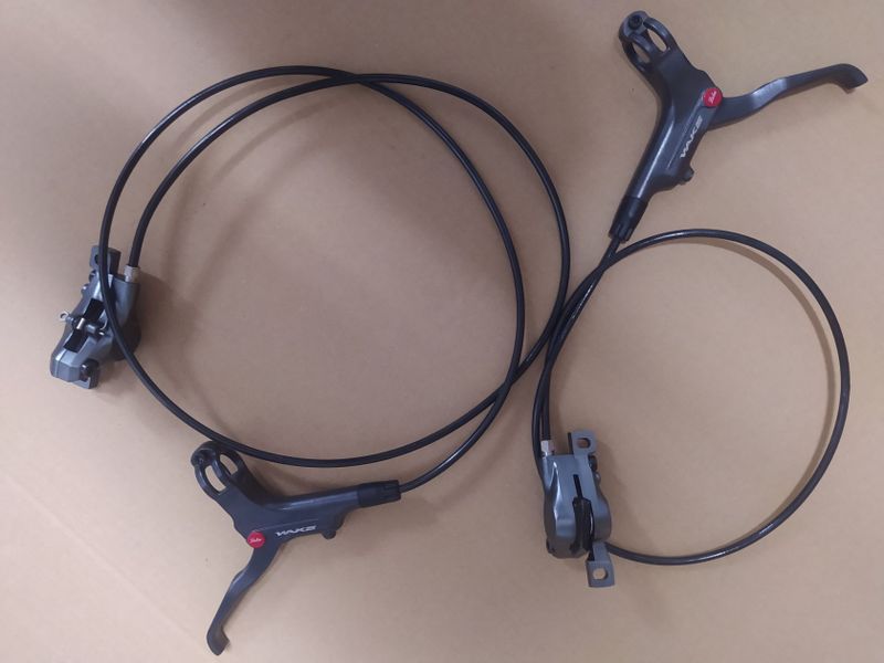 Hydraulické kotoučové brzdy Wake, nepoužité, sundané z nového kola