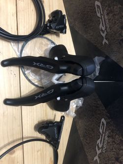 Řadicí / Brzdové páky Shimano GRX ST-RX600 + BR-RX400, hydraulika, 2x11s, Pár