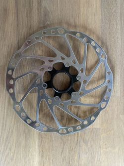2ks Brzdove kotouče SHIMANO SM-RT64-L 203mm, 4ks destičky Shimano D02S