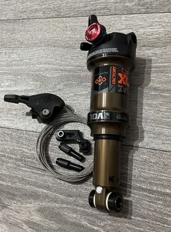 NOVÝ tlumič FOX Float DPS Factory 165x45mm + páčka zdarma!