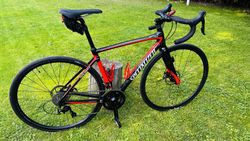 Silniční kolo Specialized 2018 Roubaix Sport Gloss Carbon / Nordic Red / Metallic White