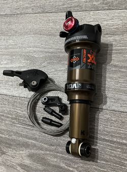 NOVÝ tlumič FOX Float DPS Factory 165x40mm + páčka zdarma!