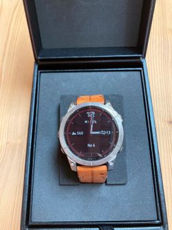 Pánské hodinky Garmin Fenix 7 Sapphire Solar Titanium / Brown Leather Band (Premium)