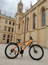 Prodám ELEKTROKOLO TOTEM MAURICE 29" ORANŽOVÁ vel.19-TESTBIKE