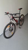 Maxbike M507 horské kolo pro teenagery 27,5'' s přední odpruženou vidlicí (černo-červené)