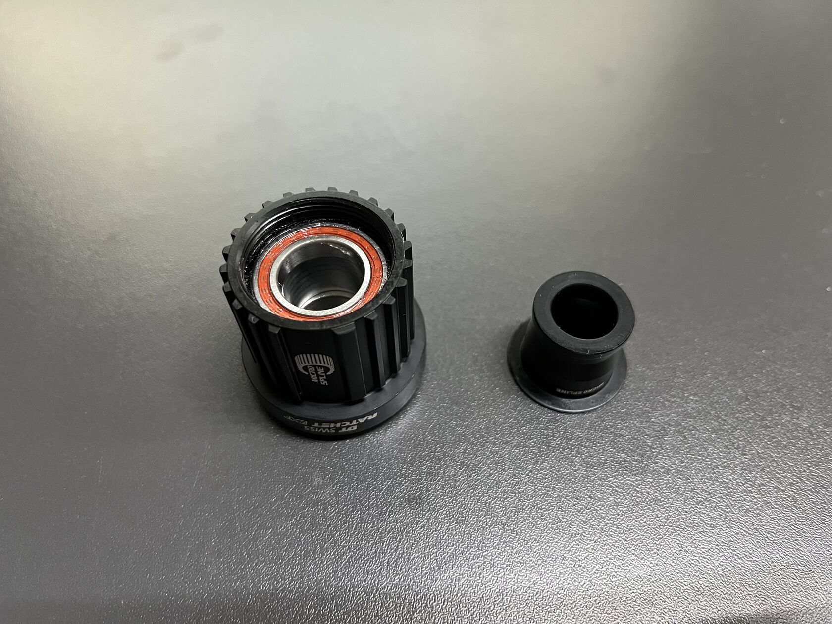 NOVÉ! DT Swiss Ratchet EXP ořech Shimano MicroSpline Alu + koncovka