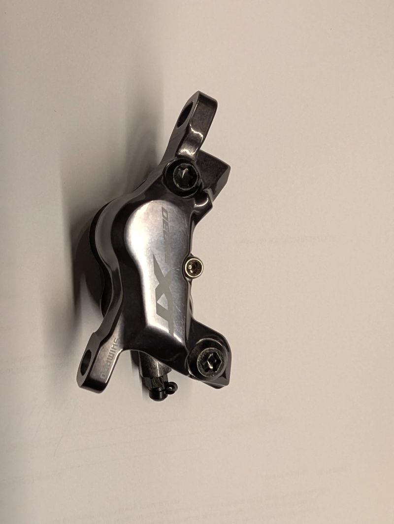 Novy ctyrpistkovy brzdovy trmen Shimano XT 8120