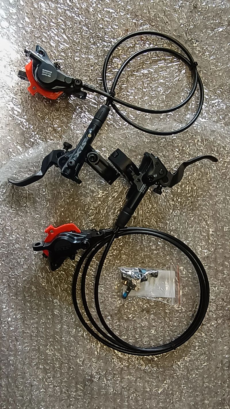 Prodám nové brzdy Shimano SLX, třmeny BR-M7100, páky BL-M7100