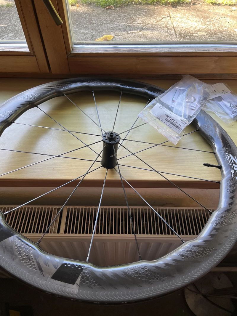 Zapletené kolo Zipp 454 NSW (pouze přední, NOVÉ)