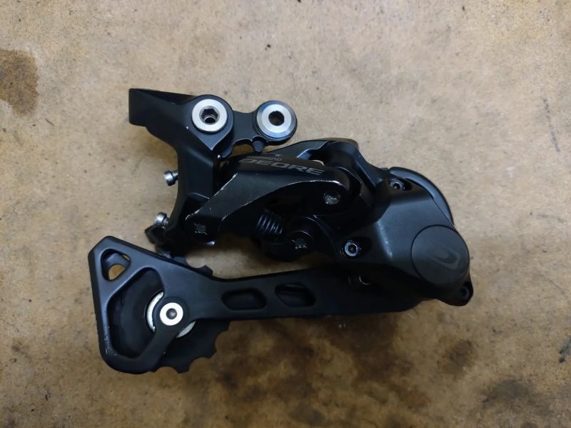 10 rychlostní sada přehazka (Deore), páčka(Deore), kazeta (SunRace)