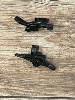 Ovladače páčky sedlovky Shimano a Max1 Evo