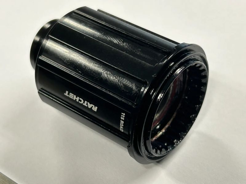 Nový Ořech DT SWISS Ratchet Shimano 11s Road pro 142/12 mm osu