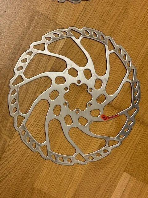 Prodám nové brzdové kotouče Shimano SM-RT66-M 180 mm a 203 mm