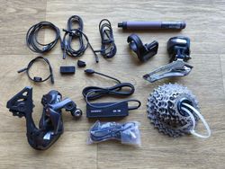 Shimano Ultegra Di2 11s sada (bez pák), kazeta 14–28, nová nabíječka