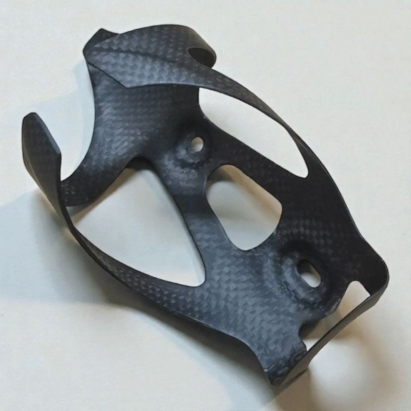 Nové Karbonové držáky na láhev pro silniční i MTB kolo - sada 2ks (váha: 24g)