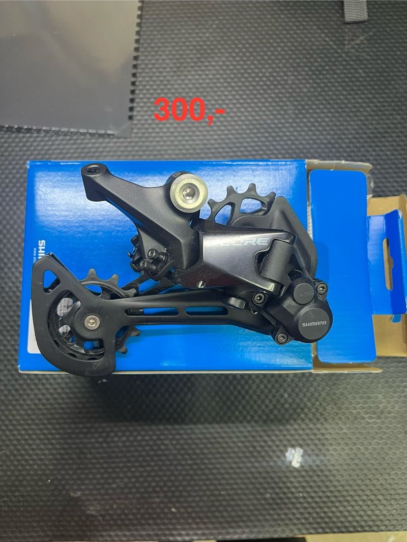 Brzdové kotouče/ přehazovačka/řazení /páky/třmen SHIMANO