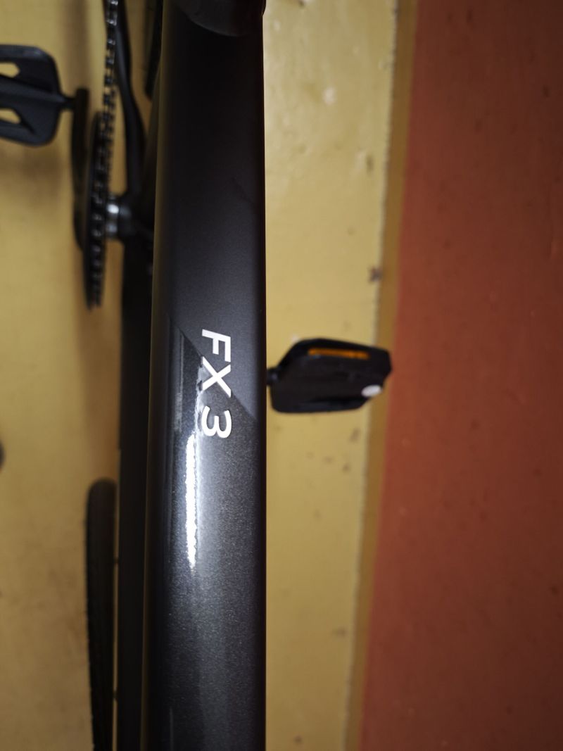Zánovní kolo Trek FX 3 EQ - záruka vel. S s doplňky