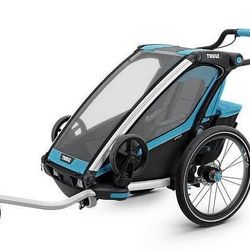 Prodám cyklovozík Thule Chariot Sport 1 modro černý, kotoučové brzdy + jogging set