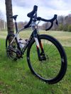 Karbonové silniční kolo OLYMPIA 300ST Boost Carbon Disc Sram RIVAL AXS 125 Years Aniversary