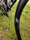 Karbonové silniční kolo OLYMPIA 300ST Boost Carbon Disc Sram RIVAL AXS 125 Years Aniversary