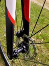 Karbonové silniční kolo OLYMPIA 300ST Boost Carbon Disc Sram RIVAL AXS 125 Years Aniversary