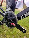 Karbonové silniční kolo OLYMPIA 300ST Boost Carbon Disc Sram RIVAL AXS 125 Years Aniversary