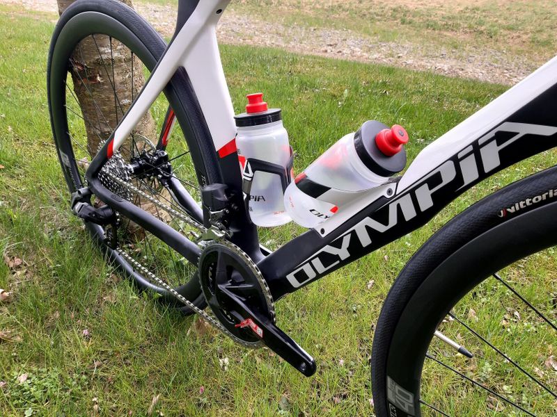 Karbonové silniční kolo OLYMPIA 300ST Boost Carbon Disc Sram RIVAL AXS 125 Years Aniversary