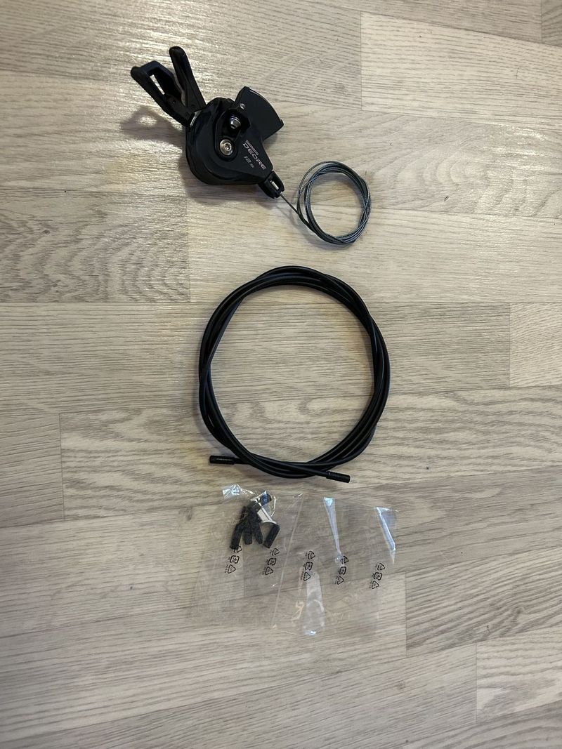 Prodám SHIMANO DEORE SL - M 6100 I-spec EV 12 sp. Pravá řadící s ukazatelem 