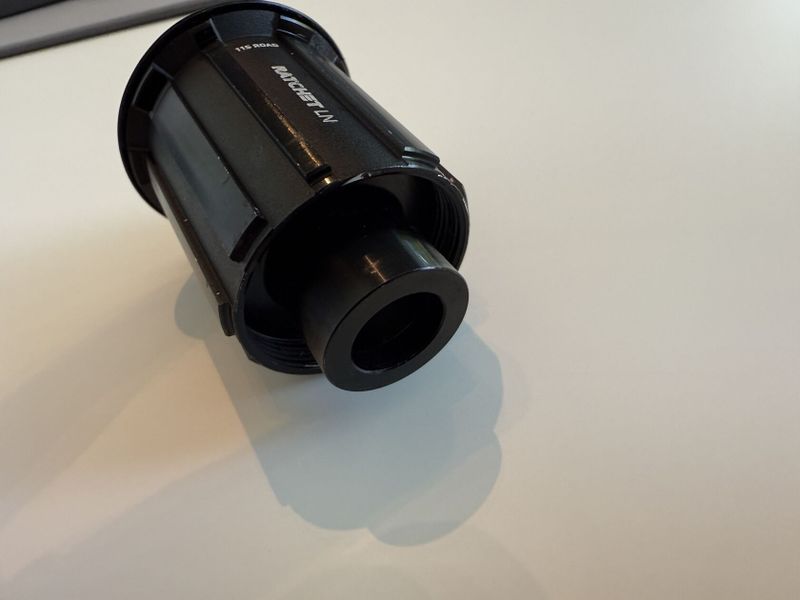 Ořech DT Swiss Ratchet LN road s koncovkou - HG Shimano/sram