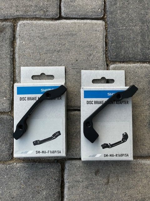 Brzdový kotouč 160 Shimano DEORE SM-RT76 + adaptéry pro brzdové kotouče. (přední, zadní) SM-MA-F160P