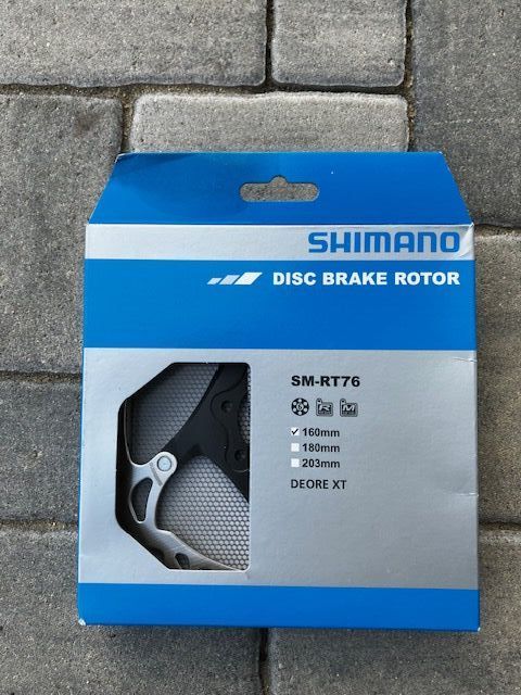 Brzdový kotouč 160 Shimano DEORE SM-RT76 + adaptéry pro brzdové kotouče. (přední, zadní) SM-MA-F160P