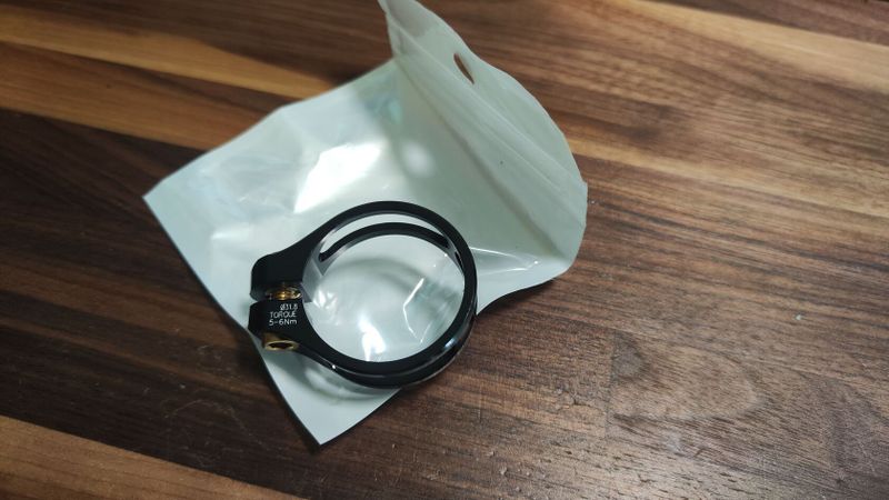 Objíma 31.6mm AL + titanový šroub