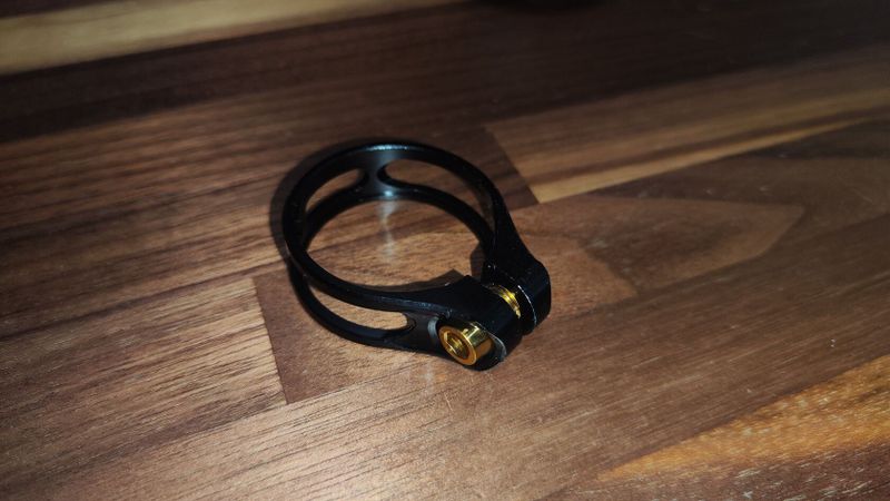 Objíma 31.6mm AL + titanový šroub