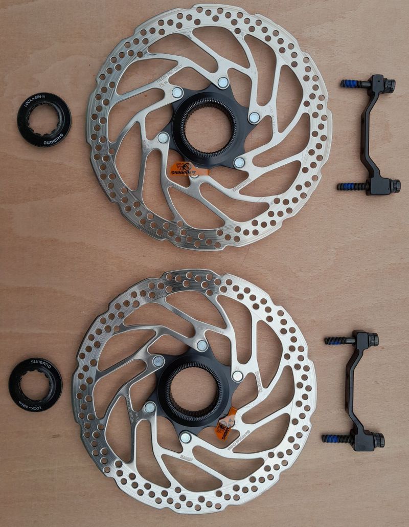 Brzdové kotouče Shimano SM-RT30, 180 mm včetně matic a adaptérů PM/PM