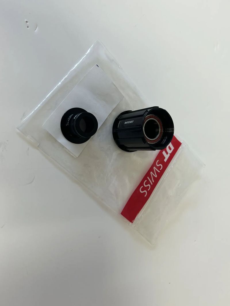 NOVÝ ořech DT Swiss - Shimano road alu. ratchat 12 mm