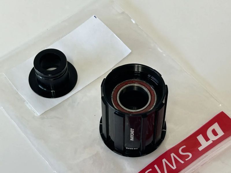 NOVÝ ořech DT Swiss - Shimano road alu. ratchat 12 mm