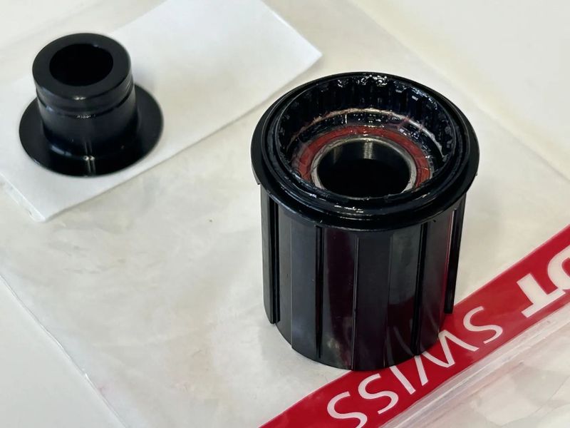 NOVÝ ořech DT Swiss - Shimano road alu. ratchat 12 mm
