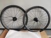 karbonové diskové výplety s Novatek náboji, Shimano ořech