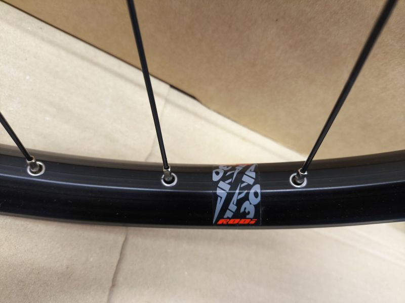zapletená kola Rodi náboje Shimano SLX