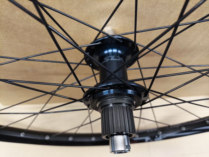 zapletená kola Rodi náboje Shimano SLX