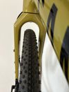 Zapletená kola HUNT 650B Adventure Carbon ořech Shimano