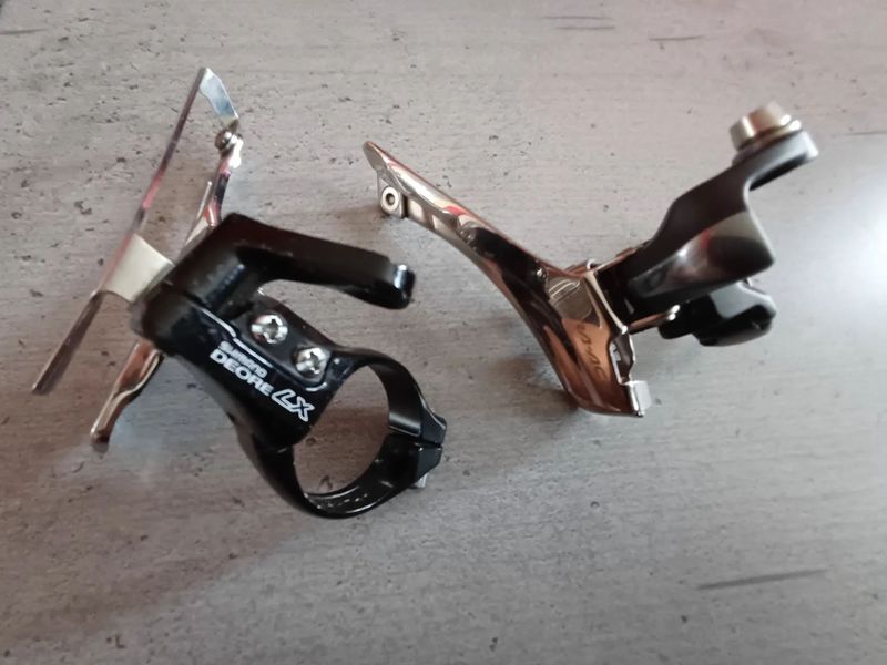 Prodám přesmykače Shimano Dura-Ace FD-7900 a Shimano Deore LX. Objímka 31,8mm.