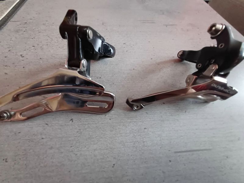 Prodám přesmykače Shimano Dura-Ace FD-7900 a Shimano Deore LX. Objímka 31,8mm.