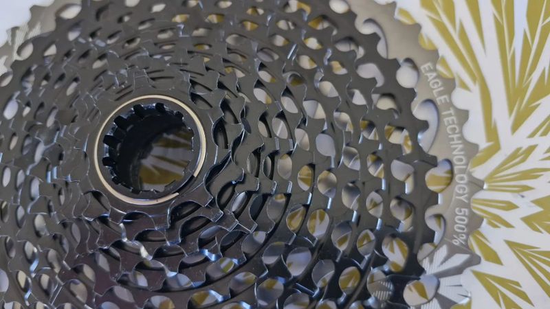 Nová nejetá kazeta, sundaná z nového kola, SRAM X01 XG 1295, 10-50z