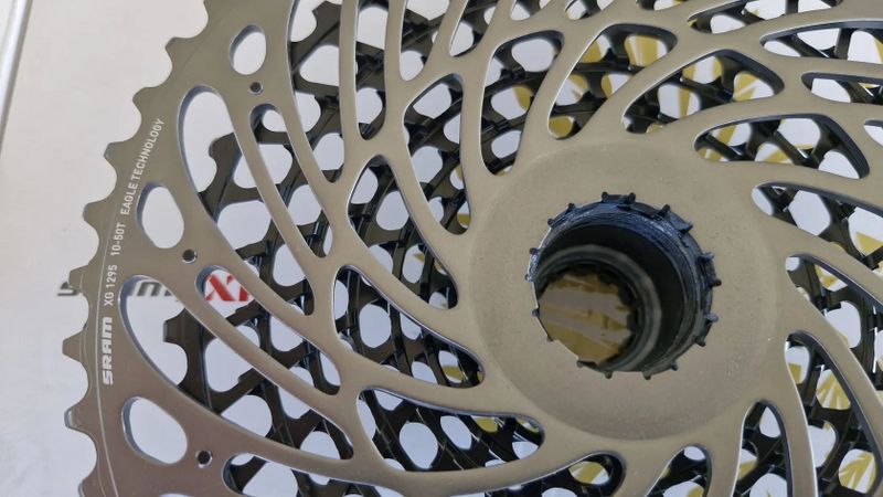 Nová nejetá kazeta, sundaná z nového kola, SRAM X01 XG 1295, 10-50z