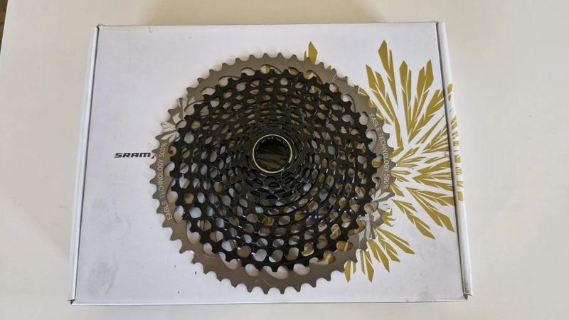 Nová nejetá kazeta, sundaná z nového kola, SRAM X01 XG 1295, 10-50z