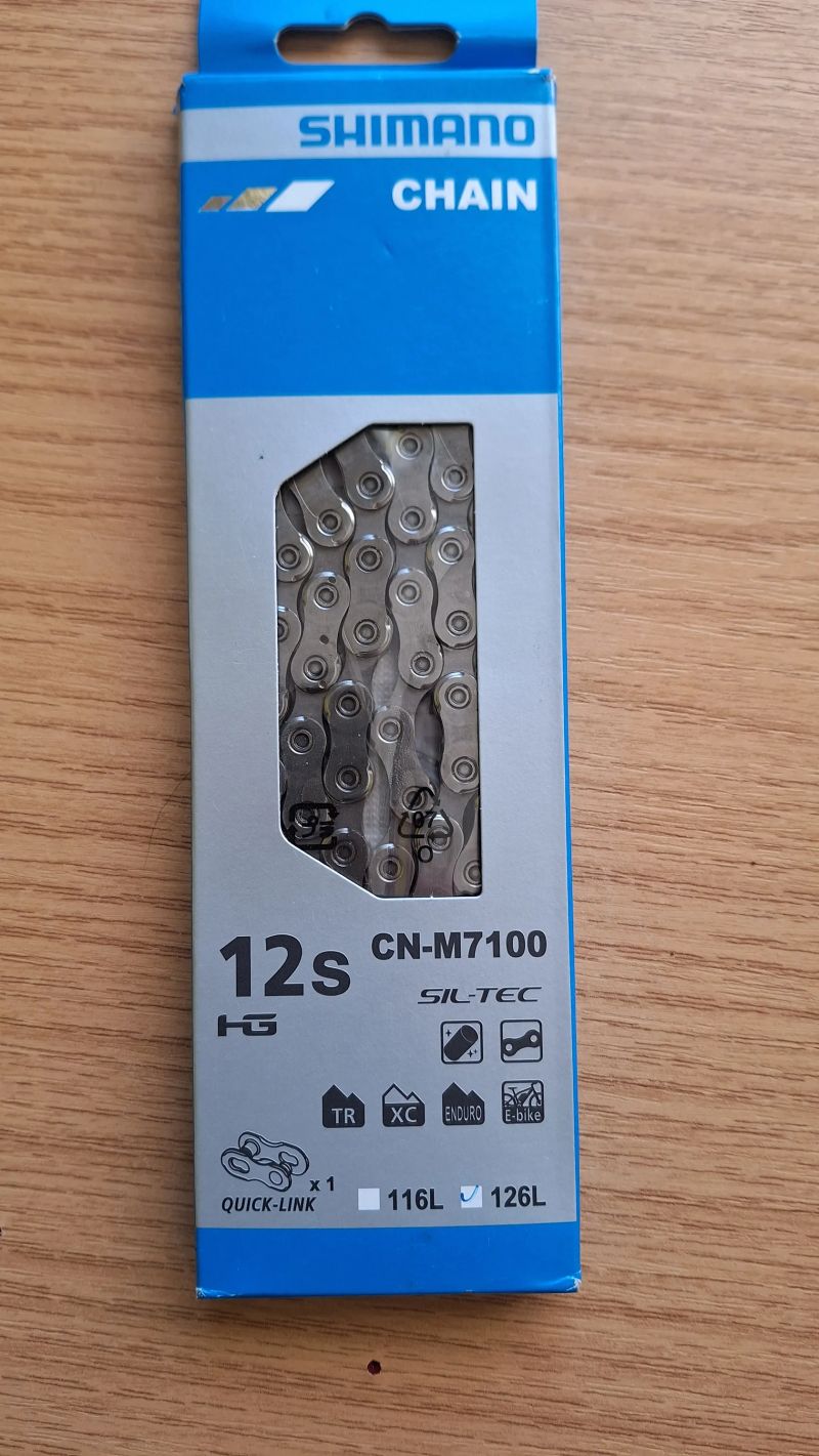  Shimano SLX, CN-M7100, 12s, 126 článků, HyperGlide+, SIL-TEC, včetně spojky 